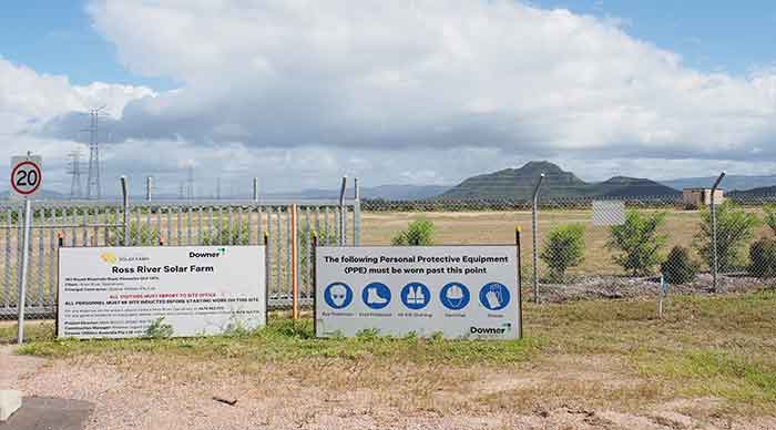 Ross River Solar farm with warning work site sign